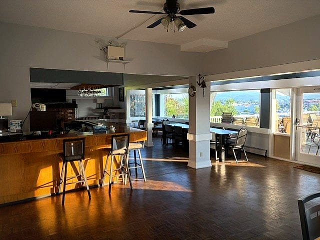 The lounge arranged for a meeting, big windows onto the water